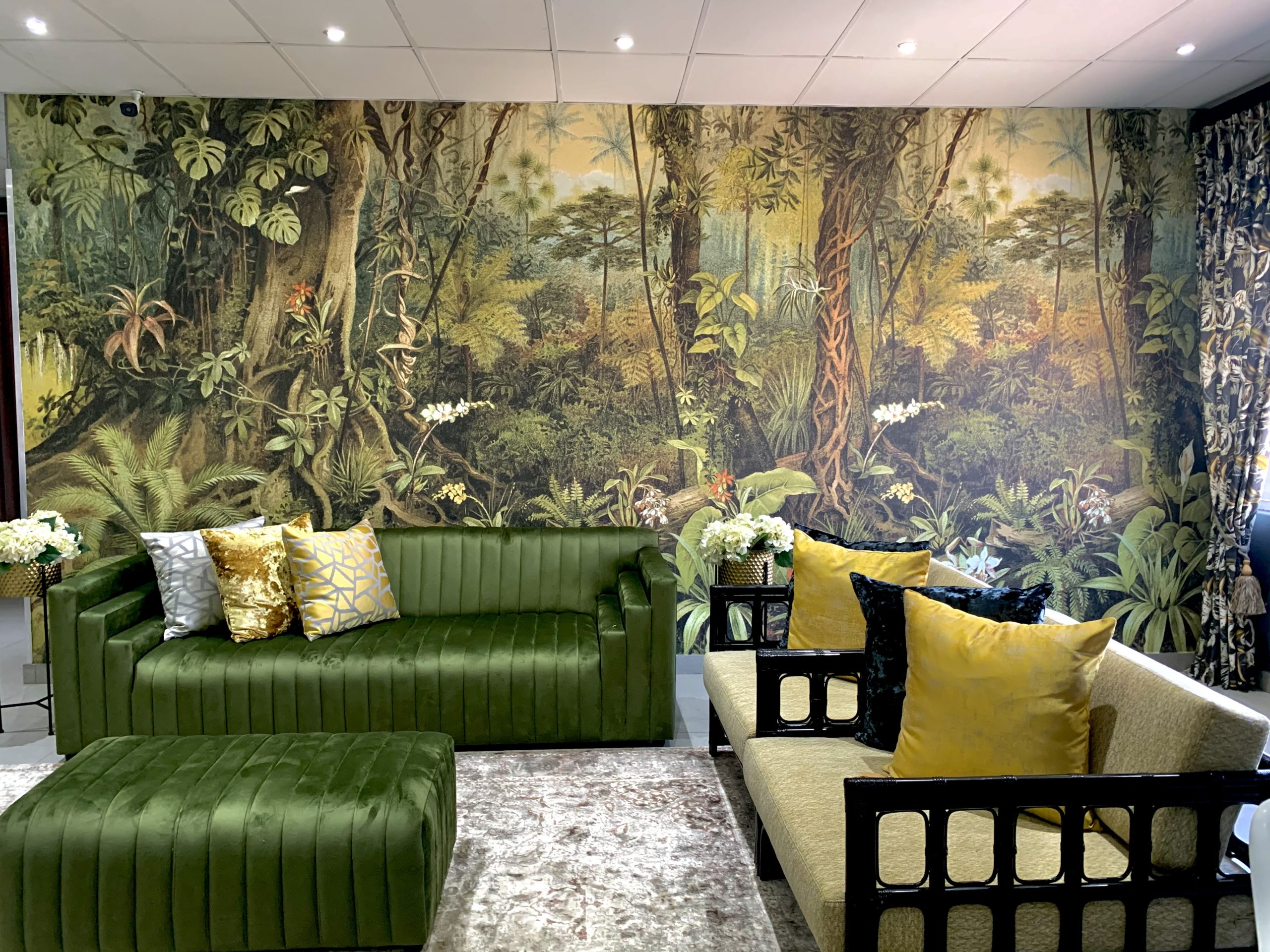 green vinatge jungle wallpaper in living room